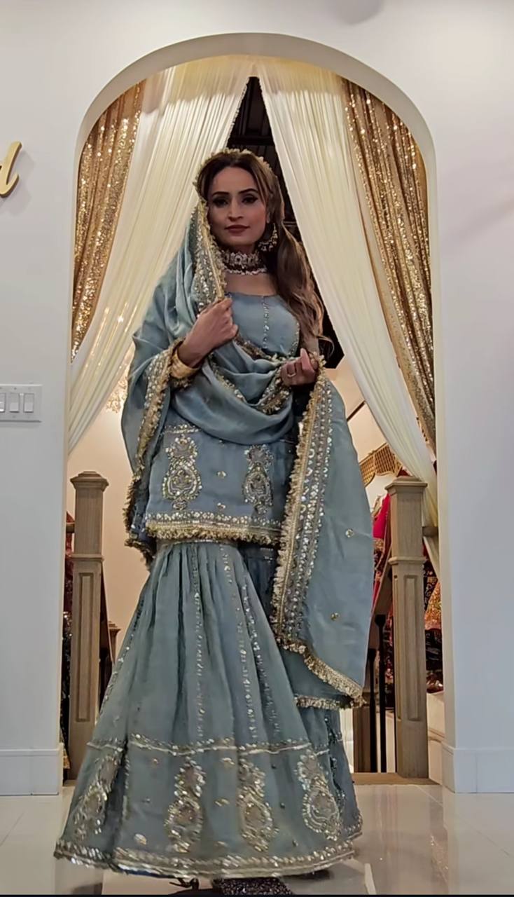 Luxurious sky outfit with sky accents and floral embroidery